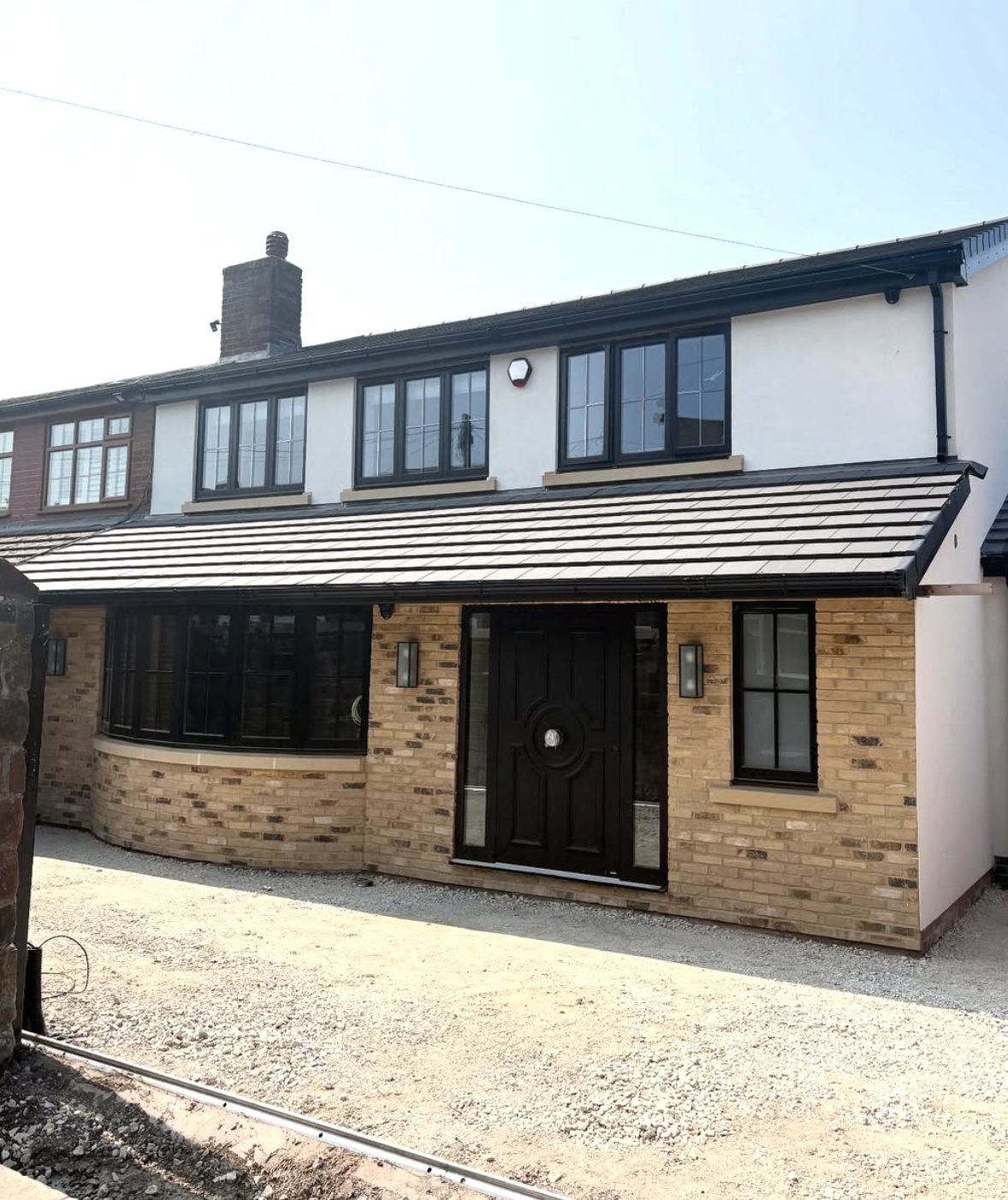 Silicone render and buff brick extension finish